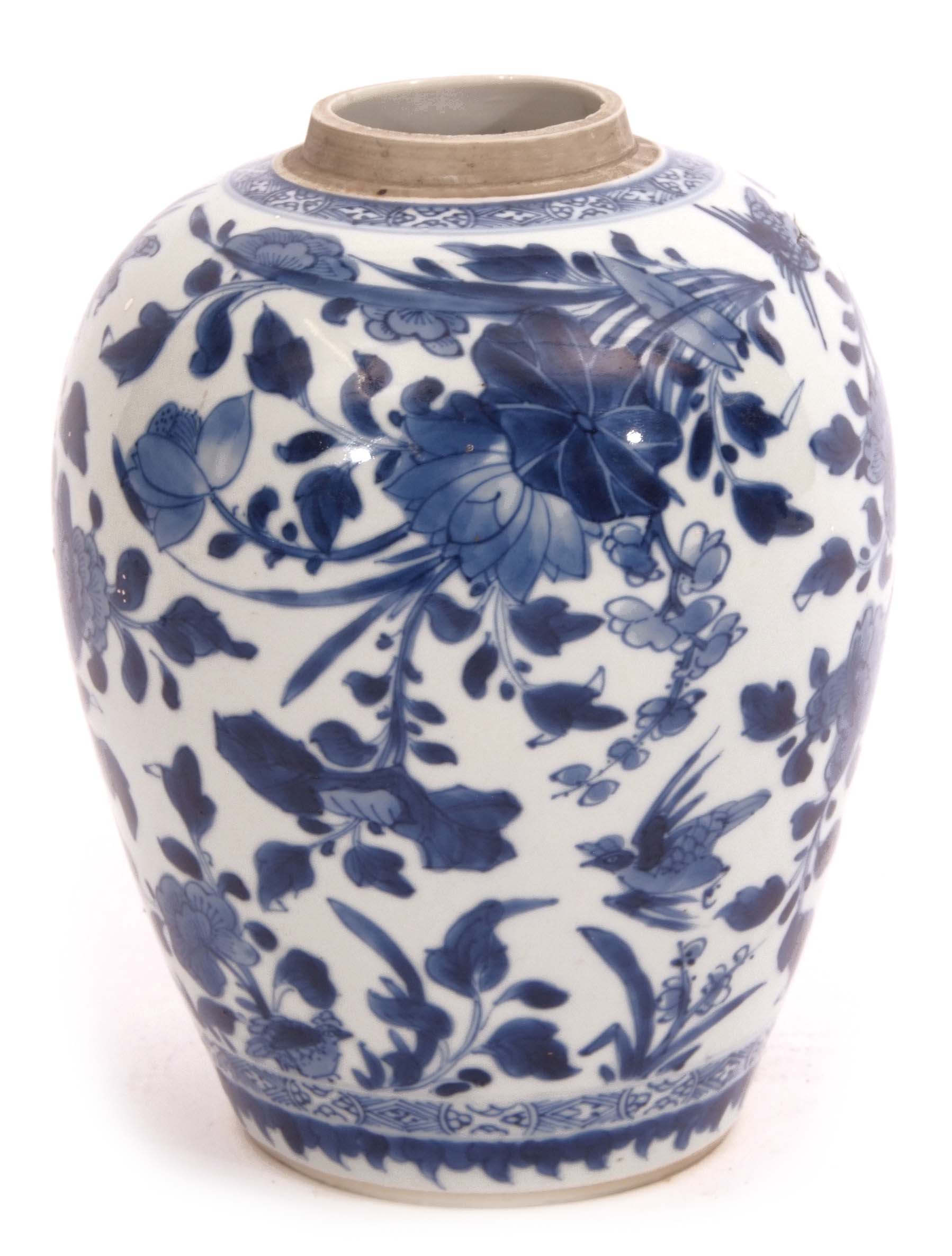 18th century Chinese porcelain ginger jar decorated in blue and white with Lotus and flowering