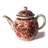 Lowestoft tea pot and cover circa 1780, the blue and white design clobbered with overglaze red
