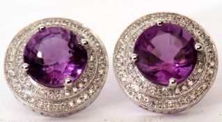 Pair of modern amethyst and diamond earrings, the round cut purple amethysts approx 5.93ct raised