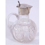 Late Victorian cut glass claret jug with solid looped handle having a plain silver collar and hinged