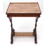 Early 19th century rosewood "silver" table, plain top with a hipped gallery surround over a plain
