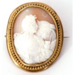 Victorian carved oval shell cameo brooch depicting day and night, in a gilt beaded frame, 5 x 4cm