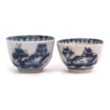 Two miniature Lowestoft tea bowls decorated with a blue and white design below a berry border (