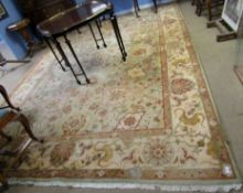 Large modern Indian or Chinese carpet with triple gull border, central panel of stylised foliage,