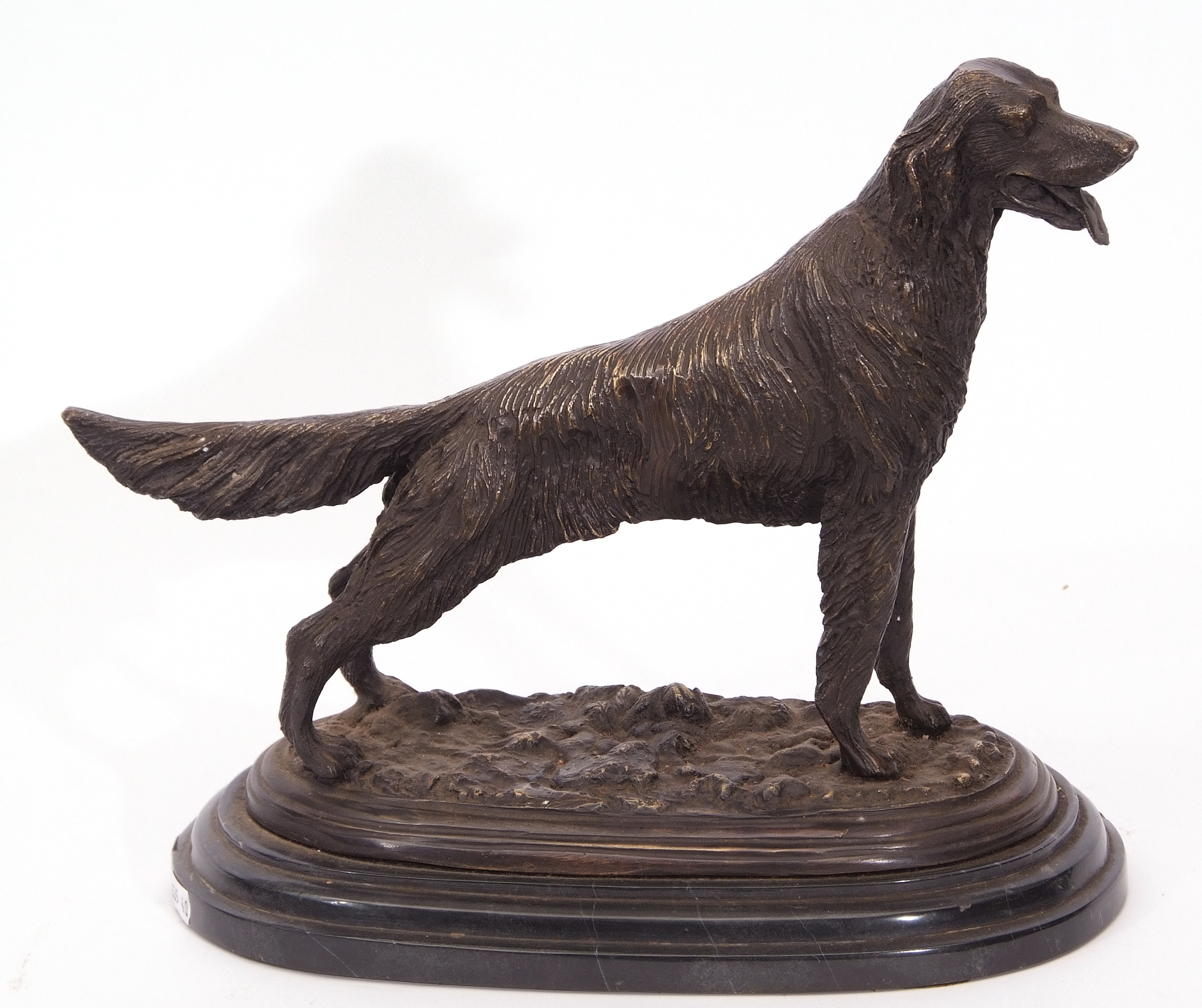 Bronze patinated cast metal study of a retriever dog in the manner of J P Mene on a black marble