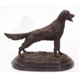 Bronze patinated cast metal study of a retriever dog in the manner of J P Mene on a black marble