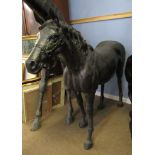 Bronze patinated cast metal garden study of a pony, 124cm high