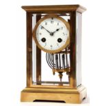 Late 19th century French lacquered band brass four-glass mantel clock, the plinth shaped case with