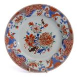 18th century Chinese porcelain Qianlong famille rose decorated plate, the centre with a peony in