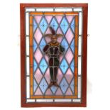 19th century/20th century mahogany framed leaded coloured glass panel of a jester, overall size