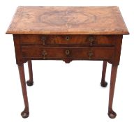 18th century walnut lowboy or side table of rectangular form, cross banded top over two frieze