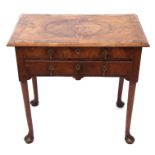 18th century walnut lowboy or side table of rectangular form, cross banded top over two frieze