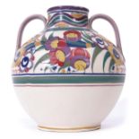 Large Poole globular vase, circa 1930s, with two lug handles, decorated with a floral design,