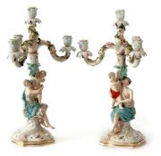 Fine pair of 19th century Meissen candelabra with the central column with a maiden and cherub, the