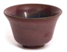 Chinese pottery bowl with everted rim and high fired rouge flambe type glaze, 8cm diam