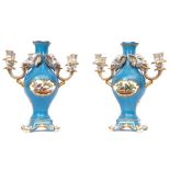 Pair of ornate Herend two-branch and four sconce candelabra, each with elephant mask mounts and