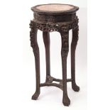 Burmese profusely carved padouk wood jardiniere or bust stand, the shaped circular top with carved