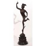 Bronze patinated or cast metal model of a winged classical messenger, raised on a black marble