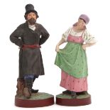 Pair of Russian (Gardner factory) porcelain figures of peasants, both decorated in typical