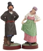 Pair of Russian (Gardner factory) porcelain figures of peasants, both decorated in typical