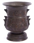 Large Chinese bronze altar vase of archaic form with typical decoration in relief, 21cm high