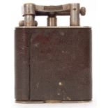 Early/mid-20th century Dunhill table lighter, leather clad with chromium or nickel mounts,