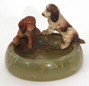 Green onyx ashtray applied with two cold painted bronze models of dogs in the manner of Bergman,