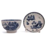 Lowestoft tea bowl with a printed design together with a miniature Lowestoft saucer with Chinese