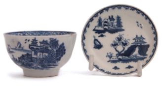 Lowestoft tea bowl with a printed design together with a miniature Lowestoft saucer with Chinese