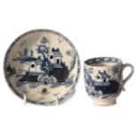 Lowestoft cup and saucer circa 1770, decorated in underglaze blue with a chinoiserie design of