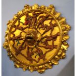 Ornate gilt wood and gesso ceiling boss with foliate and ball moulded surround, central griffon mask