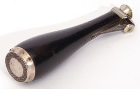 Late Victorian ebonised steel and silver mounted cigar cutter in the form of a wine bottle, 13cm