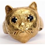 Antique yellow gold cat ring, the naturalistic cat's textured profile set with two small circular