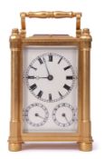 Late 19th century Swiss brass and glass cased multi-function carriage clock, having black Roman