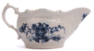 Worcester porcelain sauce or cream boat decorated with the two porter pattern with floral spray to