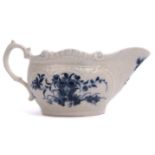 Worcester porcelain sauce or cream boat decorated with the two porter pattern with floral spray to