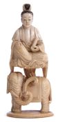 Ivory figure of a lady seated above an elephant, 16cm high