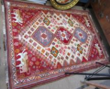 Good quality modern Caucasian wool carpet, the centre with three interlinked lozenges, the corners