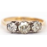 A three-stone diamond ring featuring three graduated old cut diamonds app 1.0ct weight, stamped 18ct