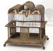 19th century Toleware metal bird cage with triple arched top, wire work surround and rectangular