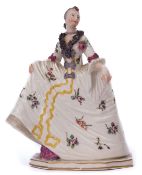 Nymphenburg porcelain Commedia dell'Arte figure designed by Franz Bustelli of a lady in flounced