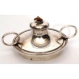 George V circular table lighter with gadrooned rim and two oval handles, 8cm diam, Birmingham 1922
