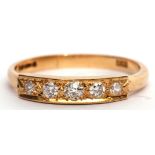 18ct gold and diamond ring featuring five graduated mixed cut diamonds, 0.40ct (est), size S/T