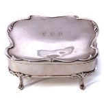 Edwardian cartouche shaped large dressing table box, the hinged lid with wavy rim and initial to