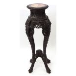 Anglo Indian hardwood and marble inset jardiniere stand, ornately carved with foliage etc raised