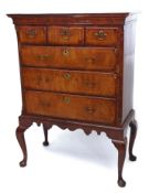 18th century oak and walnut chest on stand, the upper section with three short and three full