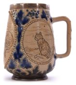 Doulton Lambeth mug with incised decoration by Hannah Barlow with three oval panels decorated with