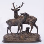 Alfred Dubucand (1828-1894) patinated and gilded bronze group of a stag and a doe, the base signed A