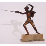 Art Deco period cold painted and bronze patinated spelter model of an actor in sword fighting