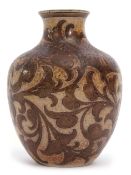 19th century Martinware vase, the beige body with a trailing incised design of dark brown leaves,